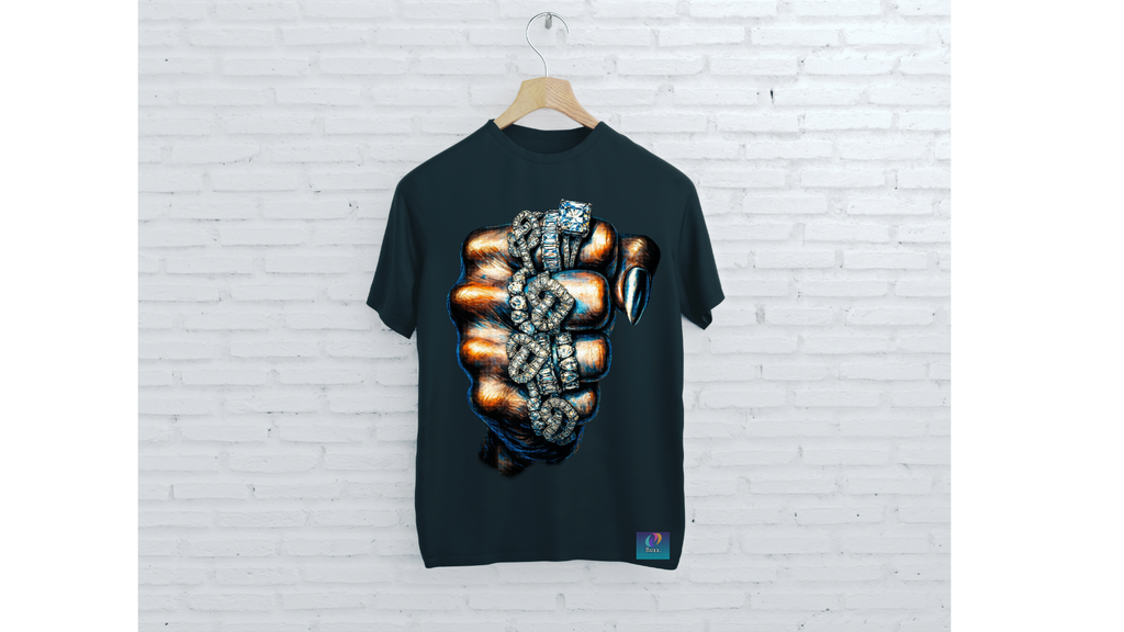 Black t-shirt with graphic design on a wooden hanger against a white brick wall.