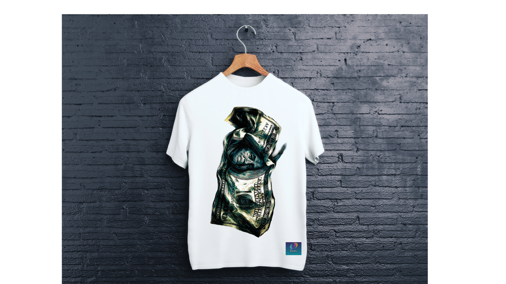 White t-shirt with a graphic design on a hanger against a dark brick wall.